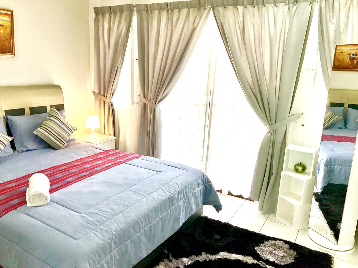 Taman Mawar Hotel บันดาร์เสรีเบกาวัน ภายนอก รูปภาพ